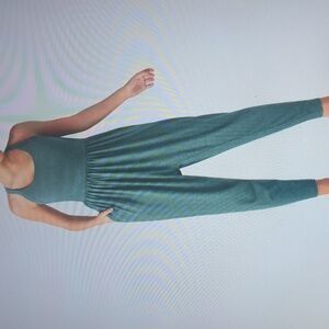 MEDIUM     HALARA BACKLESS TWISTED U NECK EASY PEEZY HAREM JUMPSUIT